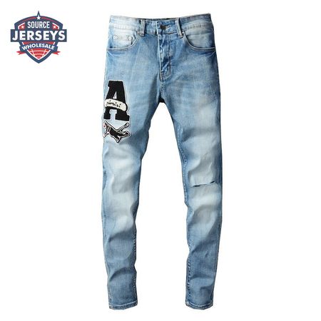 Amiri Logo Patch Rip Jeans Blue